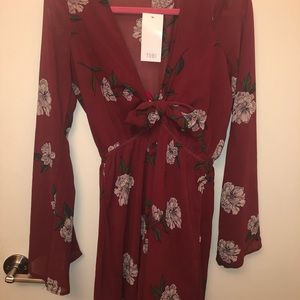Tobi dead with tags on! Red with flowers